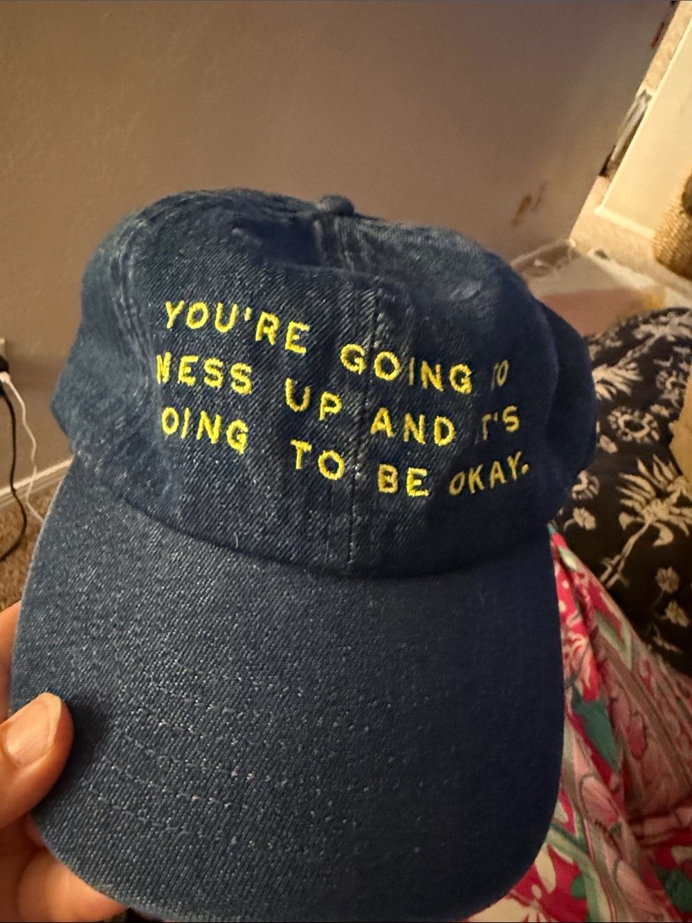 Navy Blue Baseball Cap with Yellow Message. Never worn.